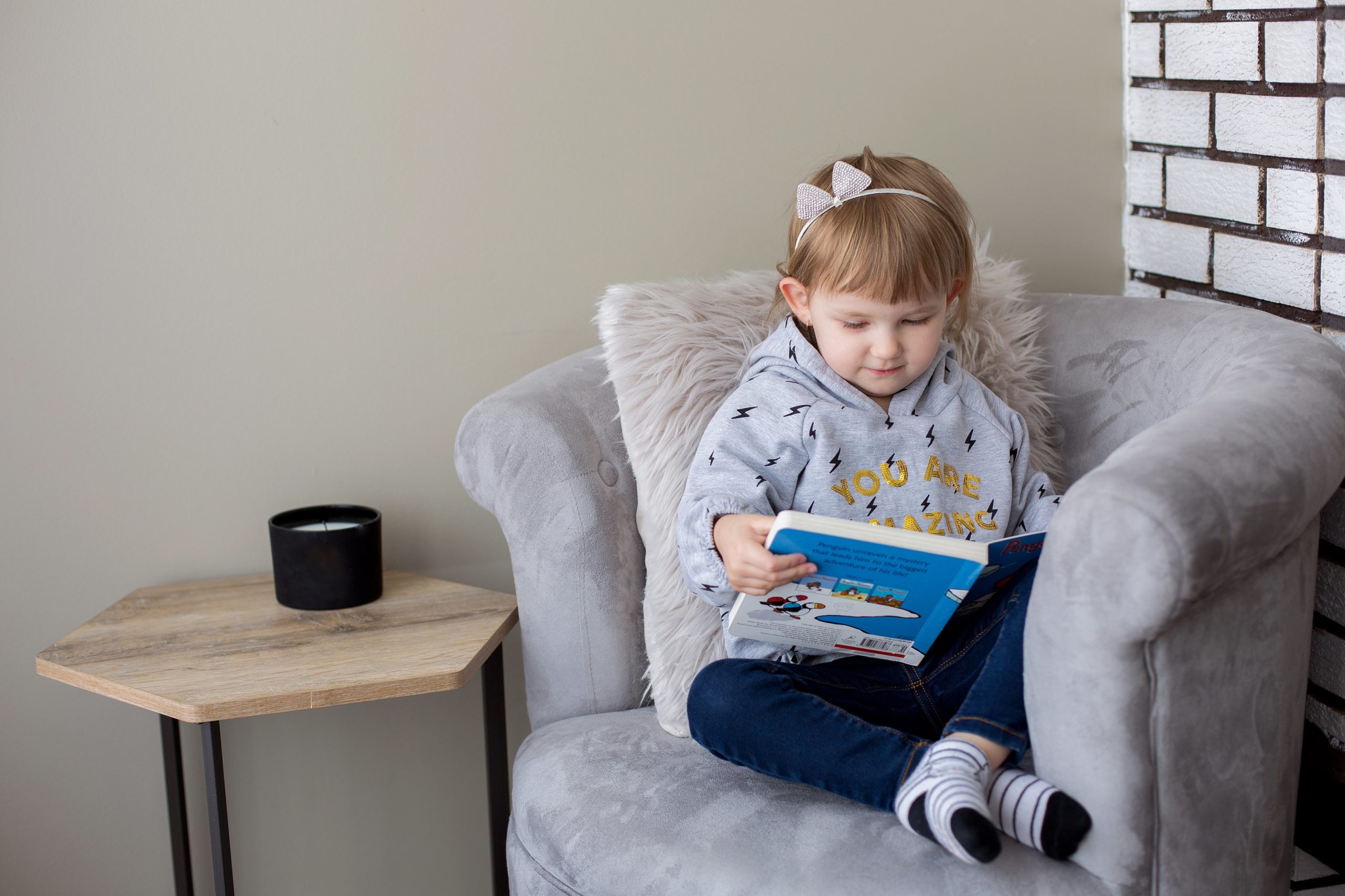 little-girl-in-her-reading-chair